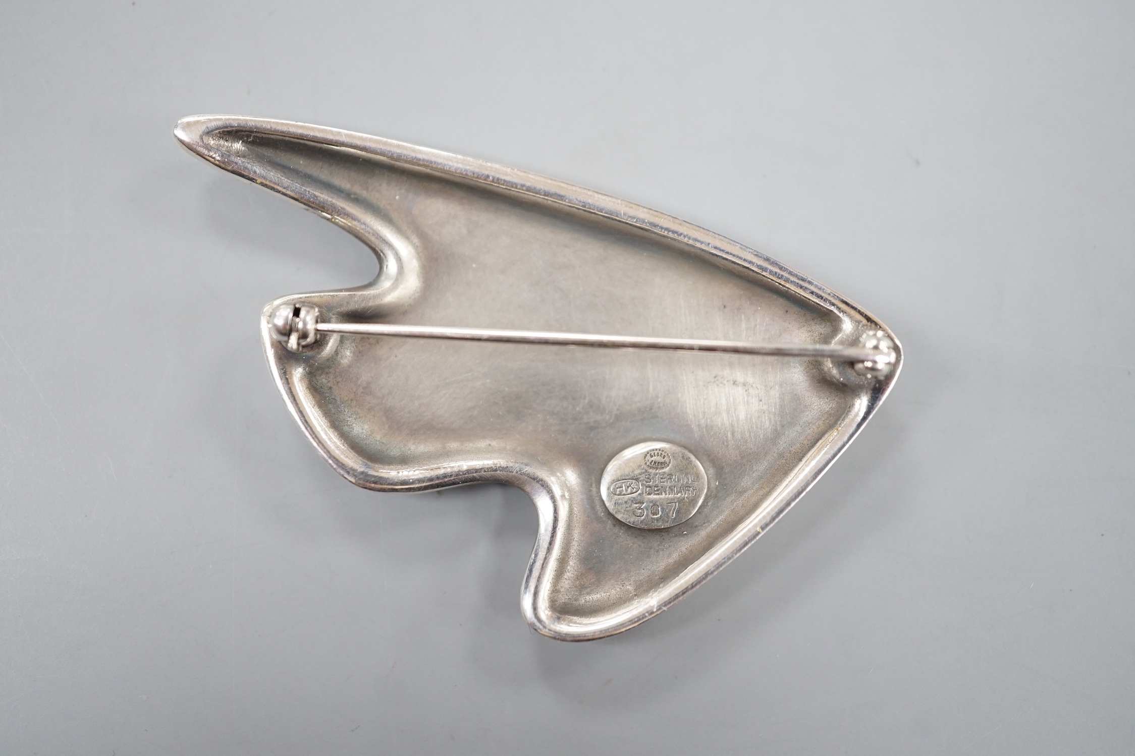 A Henning Koppel for Georg Jensen sterling and enamel stylised fish brooch, no. 307, 57mm.